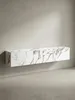 Moderne TV-Kommode zum Aufhängen in Marmor-Optik aus einer schrägen Perspektive, die die Tiefe von 30 cm und die durchgehende Maserung betont._#sku_SAFWL6.864# Produktbild-Vorschau