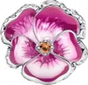 A close-up studio shot of a Pandora charm shaped like a pink and purple pansy flower with a small orange gem in the center and a silver metal setting. Produktbild-Vorschau
