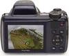 The back view of a digital camera displaying a close-up of an iguana on its screen. Produktbild-Vorschau