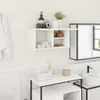 A white bathroom cabinet mounted on a white tiled wall, with various bathroom accessories and towels displayed. Náhled obrázku produktu