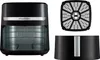 A black Russell Hobbs air fryer and its accessories are displayed against a white background. Produktbild-Vorschau