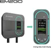 A comparison of two versions of an EM2GO charging station, showing a side-by-side view with an arrow indicating a transition from the older model to the newer model with a larger OLED display. Produktbild-Vorschau
