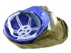 The inside of a blue protective helmet is shown, resting on a green fabric bag. Náhled obrázku produktu