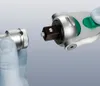 A close-up shot of a hand holding a socket wrench attachment and a ratchet handle, about to connect them. Produktbild-Vorschau