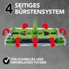 A green cleaning device with red arrows indicating its functionality, set against a gray concrete background. Produktbild-Vorschau