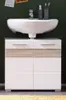 A bathroom sink and cabinet against a dark green wall. Anteprima dell’immagine prodotto
