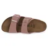 A top-down view of a pink Birkenstock sandal. Podgląd zdjęcia produktu