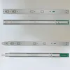 Four sets of metal drawer slides, each consisting of two parts, are arranged vertically against a light gray background. Anteprima dell’immagine prodotto