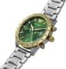 A close-up, angled view of a wristwatch with a green dial and gold bezel. Produktbild-Vorschau