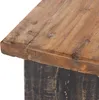 A close-up view of the corner of a wooden stool. Náhled obrázku produktu