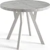 A round dining table with a gray textured top and white angular legs, presented on a white background. Náhled obrázku produktu