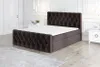 A bedroom with a bed and nightstand. Produktbild-Vorschau