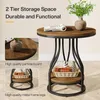 A round, two-tier side table with a wood-look top and shelves, supported by black metal legs. The table is decorated with a vase of greenery and books. Produktbild-Vorschau