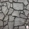 A close-up view of textured stone-like wall panels. Náhled obrázku produktu