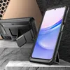 A rugged phone case with a kickstand is displayed in a studio-like setting with textured backgrounds. Náhľad obrázku produktu