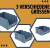 A collage of three blue storage boxes of different sizes, set against an orange and white background with geometric shapes and text. Produktbild-Vorschau