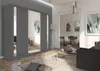 A modern living room with a large gray sliding door wardrobe with mirrored panels. Produktbild-Vorschau