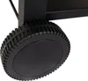 A close-up view of a black wheel on a grill. Produktbild-Vorschau