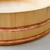A close-up view of the upper rim of a wooden bowl with copper bands. Produktbild-Vorschau
