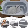 A collapsible basin with a cat inside, and smaller circular images showing a dog being bathed and a close-up of the basin's handle and structure. Voir les images du produit