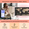 A woman is drinking from a mug while sitting on a couch, with a smartphone displaying an app and a world map on the wall in the background. Below are icons and text describing features. Produktbild-Vorschau
