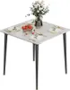 A square dining table set for four, with a vase of flowers and a bowl of strawberries in the center. Produktbild-Vorschau