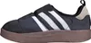 A side view of a black Adidas Puffylette sneaker with white stripes and a brown sole. Podgląd zdjęcia produktu