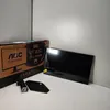 AOC gaming monitor box and monitor components on a white surface. Náhľad obrázku produktu