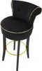 A black bar stool with gold trim and a gold footrest. Podgląd zdjęcia produktu