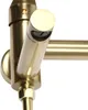 A close-up view of a gold-colored faucet. Podgląd zdjęcia produktu