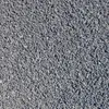A close-up, top-down view of dark gray gravel. Produktbild-Vorschau
