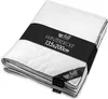 A folded white winter duvet with a black band around it, displaying product information. Produktbild-Vorschau