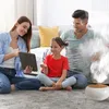 A family is sitting on the floor in a living room, with a diffuser emitting mist. Podgląd zdjęcia produktu
