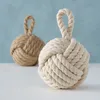 Butoir de porte NŒUDS en tricot - set de 2 pièces en crème Voir les images du produit 3