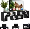 A black modular TV stand with a television on top, displaying a nature scene and app icons. Decorative items and books are placed on the shelves. Náhled obrázku produktu