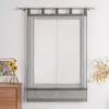 A sheer grey Roman blind hanging on a curtain rod against a white wall. Produktbild-Vorschau