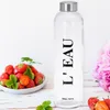 Dekoracyjna butelka na wodę 700 ml ze stalową pokrywką i Podgląd zdjęcia produktu 10