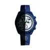 A split image of a blue Swatch x Omega Moonswatch, with one half illuminated and the other half in shadow. Produktbild-Vorschau