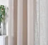 A close-up view of a beige linen-textured curtain. Produktbild-Vorschau