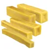 Several pieces of yellow, rectangular dog chews are arranged diagonally on a white background. Produktbild-Vorschau