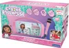 The image shows the retail packaging of a Gabby's Dollhouse Bluetooth speaker with a microphone. The packaging features colorful graphics and images of the characters from the show. Voir les images du produit