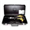 A yellow and black Dewalt demolition hammer is shown inside its black carrying case. Podgląd zdjęcia produktu