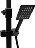 A close-up view of a black shower head and part of the shower system, isolated on a white background. Náhled obrázku produktu