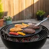 Food being grilled on a barbecue. Podgląd zdjęcia produktu
