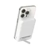 A white Belkin BoostCharge Pro magnetic power bank attached to the back of a white iPhone. Voir les images du produit