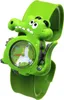 A close-up studio shot of a child's watch designed as a green alligator. Voir les images du produit