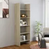 A tall, narrow bookshelf with multiple shelves, filled with decorative items and books, placed against a light gray wall. Náhled obrázku produktu