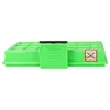 A green vacuum cleaner filter with a black push tab and a red caution symbol. Produktbild-Vorschau
