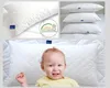 A collage of images showing white pillows, including one with a baby. Produktbild-Vorschau