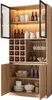 A wooden cabinet with glass doors, displaying wine bottles, glasses, and kitchenware. Náhled obrázku produktu